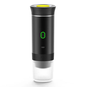 Portable electric espresso maker with a black body, yellow top button, and green power indicator.