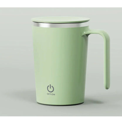 Sleek green electric coffee mug with handle and lid on neutral background